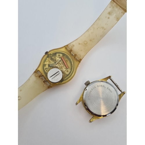 152 - A Tom and Jerry Watch and a Swatch Watch