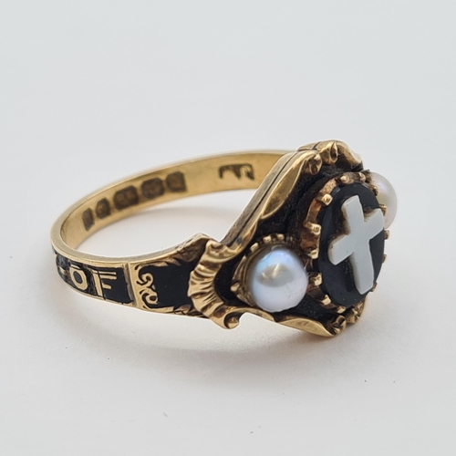 175 - A Victorian Mourning Ring set agate with carved cross and pearls, inscribed 'In Memory Of' in 18ct g... 