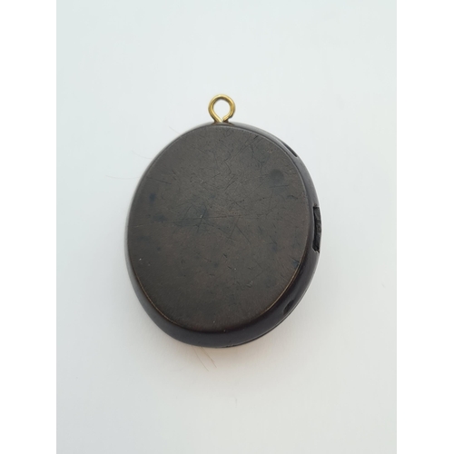 180 - A Victorian Bog Oak oval Mourning Locket