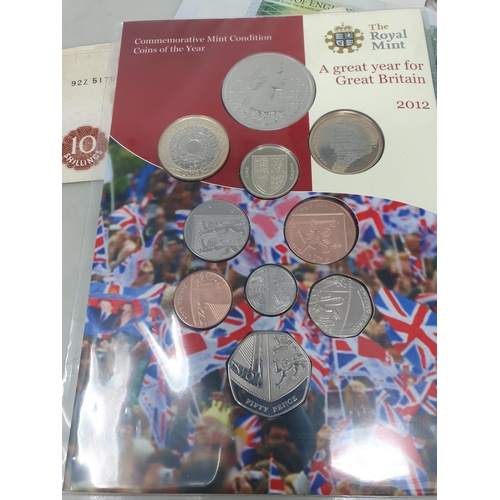 223 - A Collection of of British and World Coins including two silver Ingot Stamp Covers, silver Threepenc... 