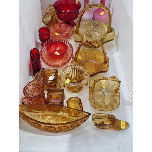 270 - A quantity of moulded amber Glass including Baskets, Bowls etc, moulded red Glass including Pedestal... 