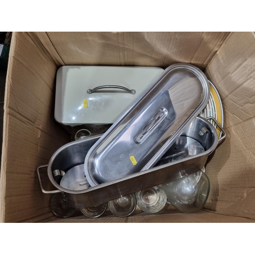 297 - Three boxes of items including a stainless steel Fish Kettle, a Bread Bin, Decanters, a metal cylind... 