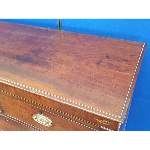 30 - A 19th Century mahogany and inlaid Chest of two short and three long drawers raised on ogee bracket ... 