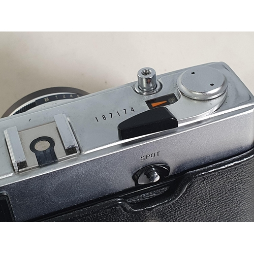 303 - An Olympus - 35 SP Camera No - 187174 in fitted black leather case.