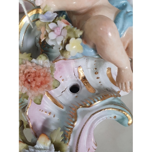 306 - A Sitzendorf porcelain Wall Bracket, floral encrusted and mounted with winged cherub, 8in and a smal... 