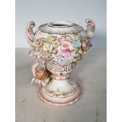 306 - A Sitzendorf porcelain Wall Bracket, floral encrusted and mounted with winged cherub, 8in and a smal... 