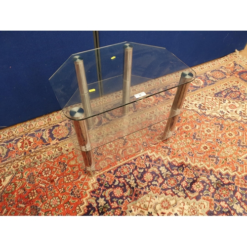 31 - A three tier glass and chrome style Television Stand. (R2).