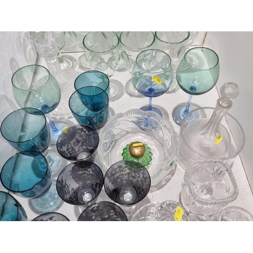 314 - A quantity of glassware including three Decanters, Wine Glasses with coloured bowls, Vases and Bowls... 