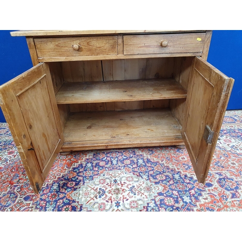 33 - A Victorian pine Bookcase with upper section fitted pair of glazed doors above base fitted single fr... 