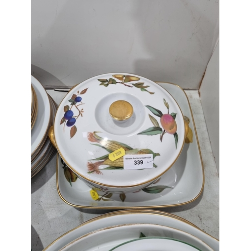 339 - A quantity of Royal Worcester Evesham dinner to table ware, including Tureen, Souffle Dish, Serving ... 