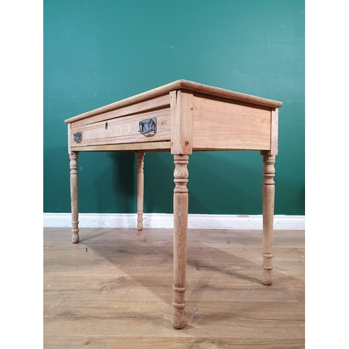 403 - A Victorian stripped wood Side Table fitted single frieze drawer raised on turned supports 3ft 6in W... 