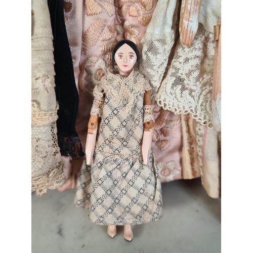 41 - Nine antique Peg Dolls in traditional costumes (R6)