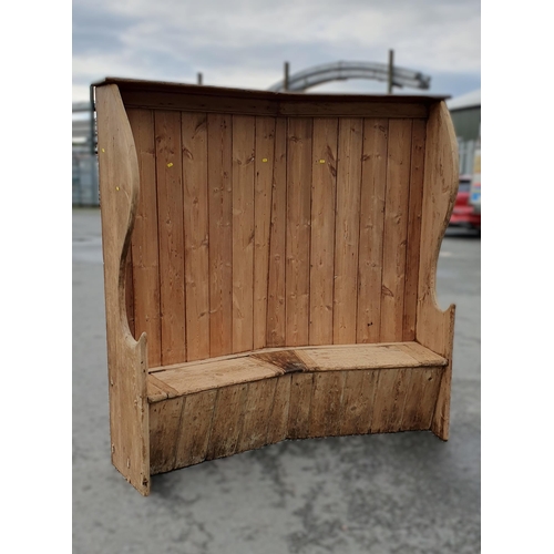 425 - A 19th Century pine curved Settle with box base fitted two hinged lids 5ft 10in H x 5ft 5in W (R1)