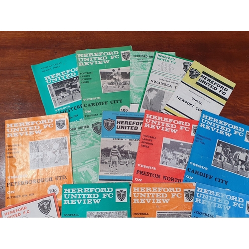 482 - A collection of Hereford United Football memorabilia consisting of mainly Programmes, a 1988-89 Team... 