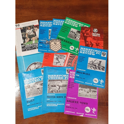 482 - A collection of Hereford United Football memorabilia consisting of mainly Programmes, a 1988-89 Team... 