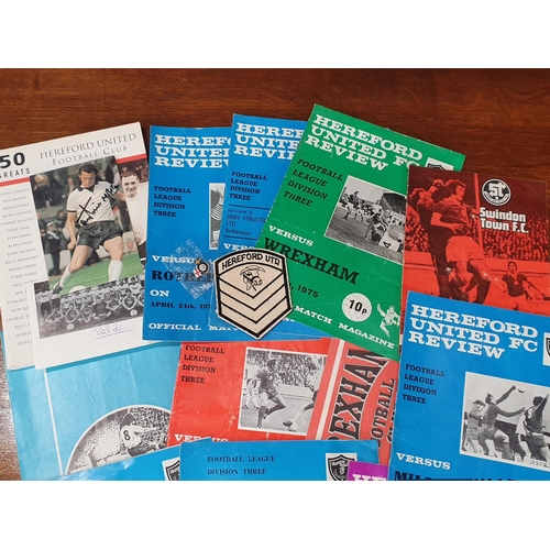 482 - A collection of Hereford United Football memorabilia consisting of mainly Programmes, a 1988-89 Team... 