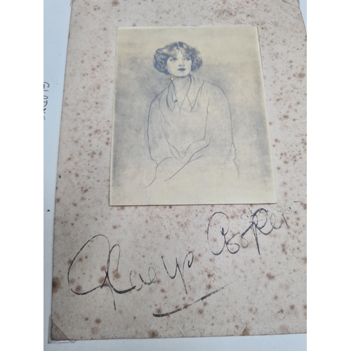 57 - An early 1900's Autograph Album containing watercolours, signed photographs including Malcolm Campbe... 