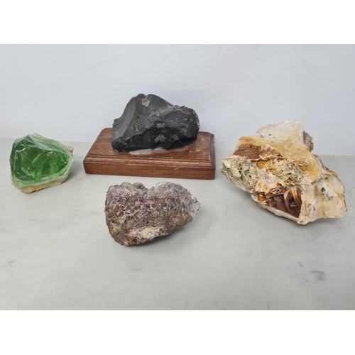 58 - An unclassified Meteorite on wooden stand and three other Mineral Specimens (R2)