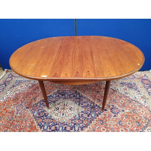 8 - A teak G-Plan extending Dining Table 4ft D (closed) x 2ft 5in H