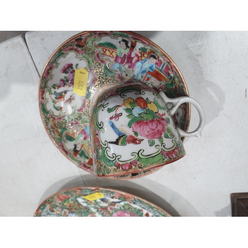 320 - A Cantonese Kettle lacking handle, decorated panels of figures and flowers on associated wooden stan... 