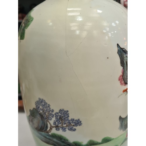 313 - A floral moulded Jug with bird handle, 12in H, two porcelain Table Lamps and a Chinese baluster Vase... 