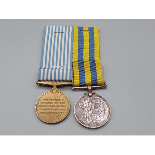 1039 - Pair; Queen's Korea Medal (Canada) and UN Korea Medal engraved to SC64760 L.J. McKenna, Canadian For... 