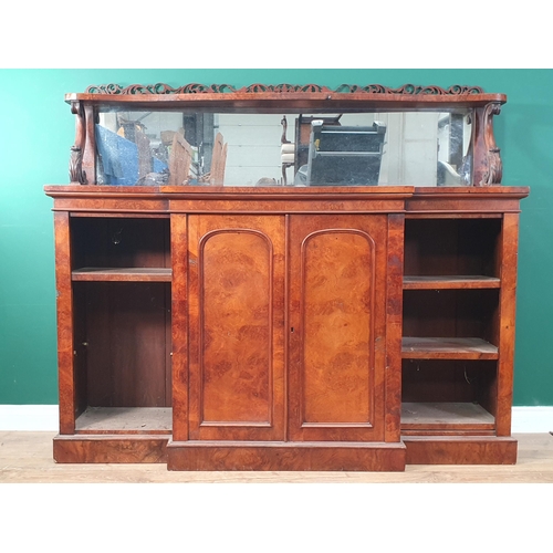 471 - An early Victorian walnut Breakfront Bookcase the raised mirror back with pierced carved fret galler... 