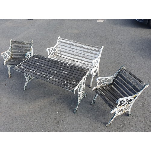 691 - A painted and weathered cast metal and wooden slatted Garden Furniture Set comprising of a pair of C... 