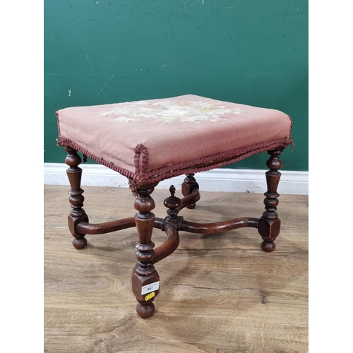 847 - A Queen Anne style Footstool with pink needlework seat on turned supports united by X-stretcher A/F ... 