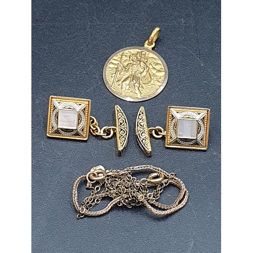 A St Christopher Medallion, marked 9ct, 3.5gms, and a pair of gilt