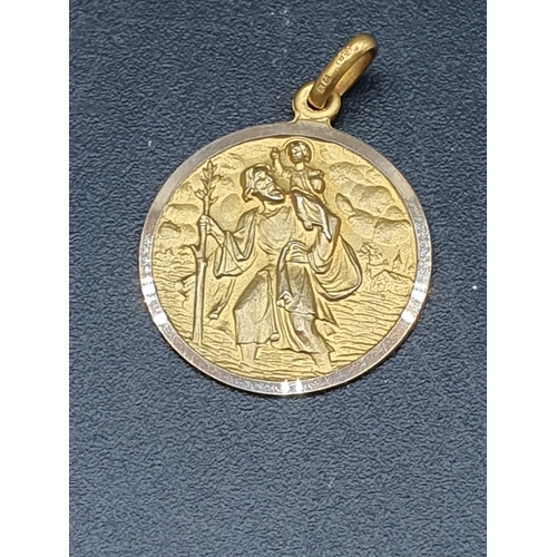 A St Christopher Medallion, marked 9ct, 3.5gms, and a pair of gilt
