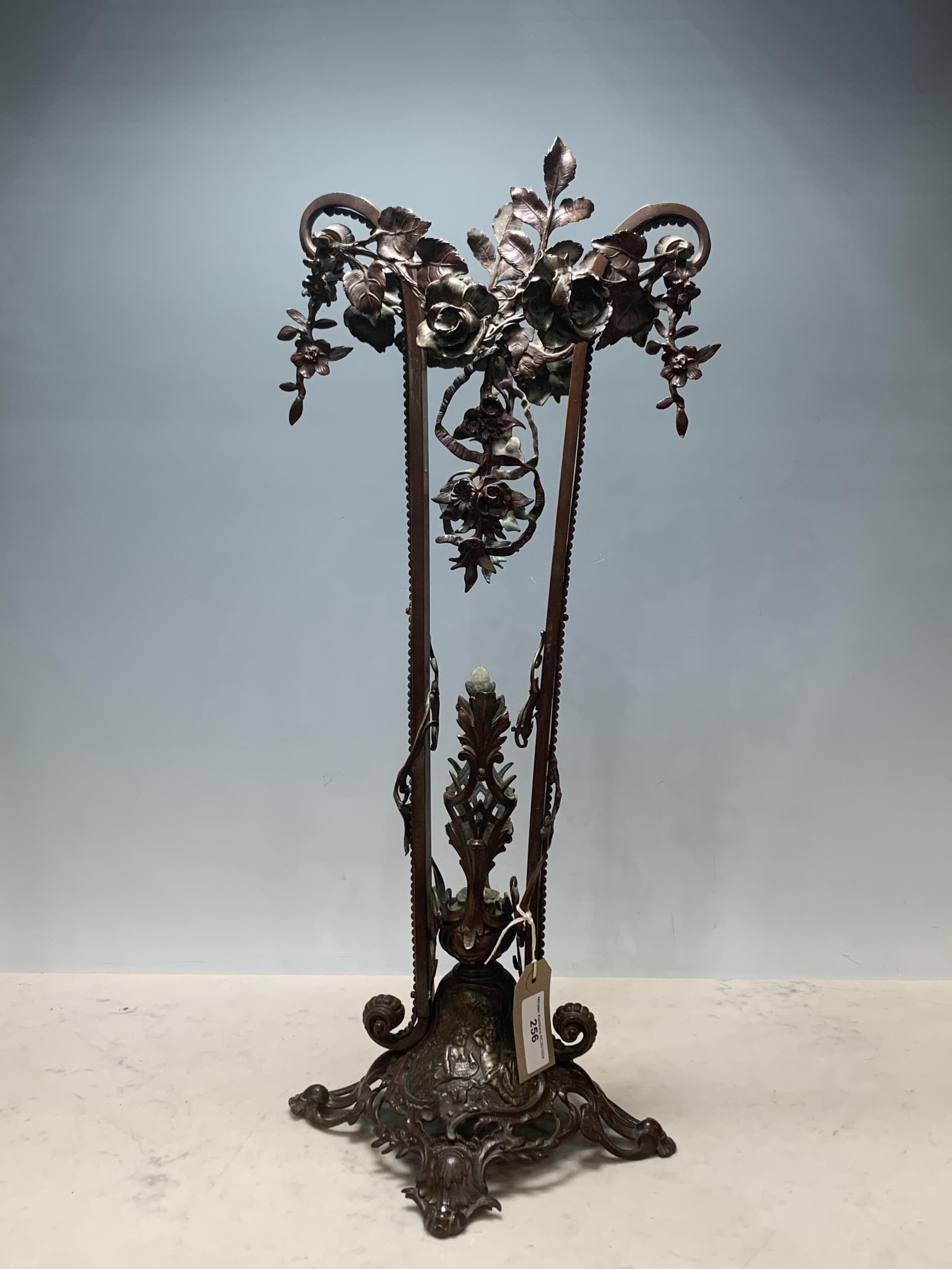 A large bronzed metal Epergne Stand, decorated with foliate swags