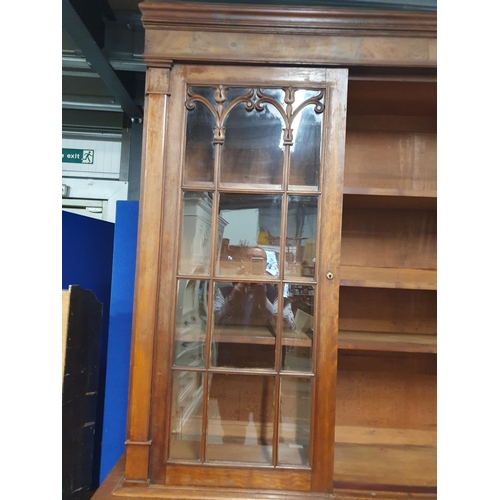 788 - A 19th Century mahogany Secretaire Bookcase, the upper section with pair of glazed doors enclosing t... 