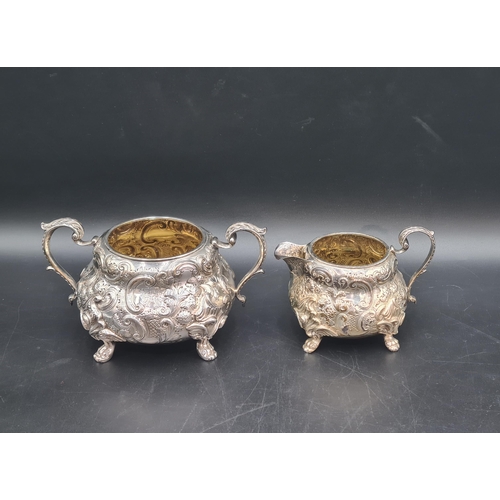 100 - A Victorian silver four piece Tea & Coffee Service with floral and scroll embossing, engraved initia... 