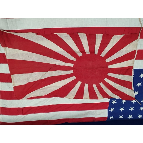 1054 - An antique American 'Stars and Stripes' Flag 4ft 8in W x 2ft 8in H, a Japanese 'Rising Sun' Flag 2ft... 