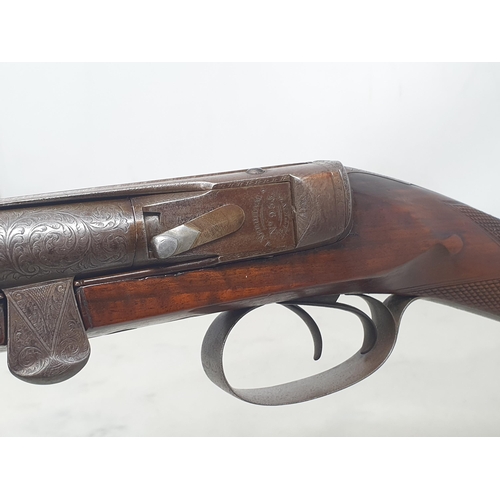 1057 - A scarce double barrelled 16 bore Needham's Patent needle fire shotgun. Needham's London address to ... 