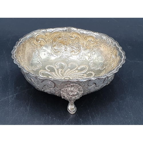 106 - A Victorian silver Sugar Bowl with leafage and scroll embossing, engraved Somerest crest with portcu... 