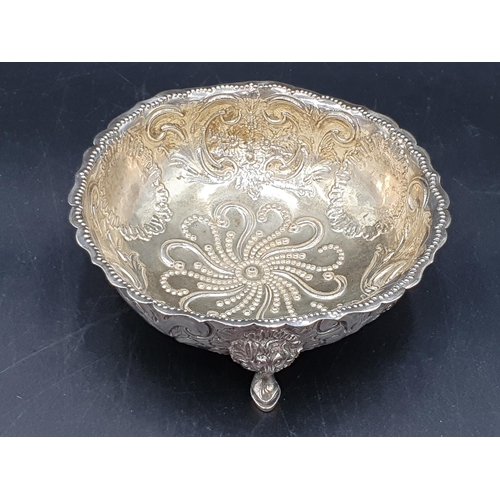 106 - A Victorian silver Sugar Bowl with leafage and scroll embossing, engraved Somerest crest with portcu... 