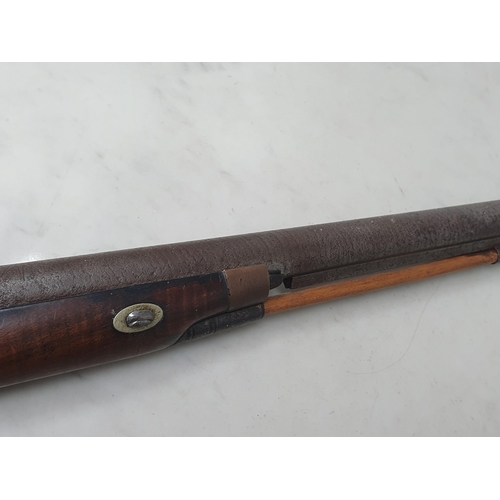 1064 - A 19th Century single barreled muzzle loading percussion Sporting Gun with damascus barrel 26in L an... 