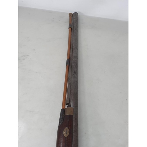 1064 - A 19th Century single barreled muzzle loading percussion Sporting Gun with damascus barrel 26in L an... 