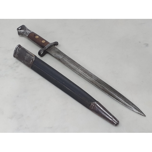 1071 - A Pattern 1888 Long Lee Enfield Bayonet by Mole dated 1898, in steel mounted leather Scabbard