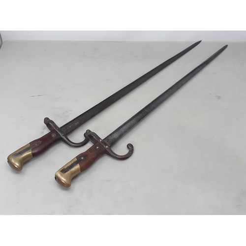 1076 - Two 1878 Pattern Fusil Gras Bayonets