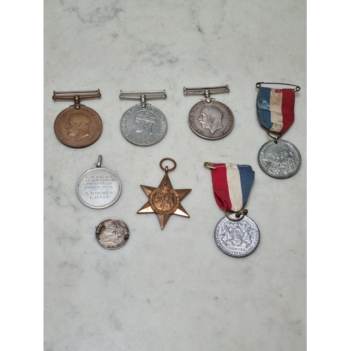 1098 - A WWI pair including a 1914-1918 Medal and Mercantile Marine Medal inscribed 'R.Hughes'; a pair of W... 