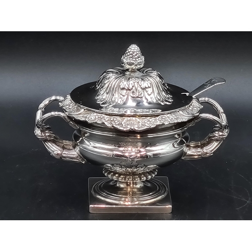 120 - A Victorian silver Mustard Pot and Cover in the form of a Warwick Vase with entwined handles, shell ... 