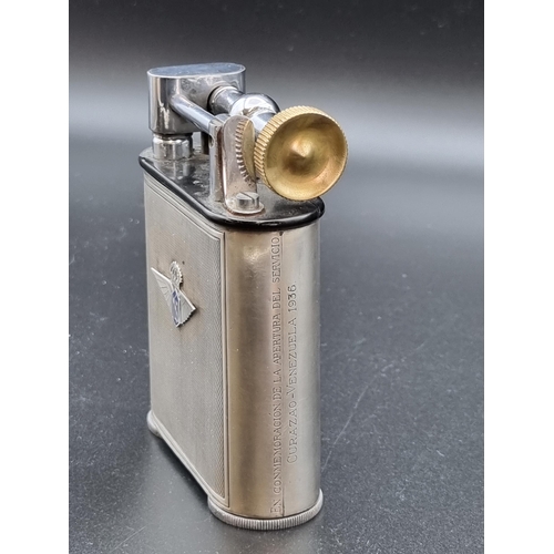 297 - An Art Deco, KLM Dutch Airlines 935 silver Jumbo lift arm Table Lighter, commemorating the 1935 flig... 