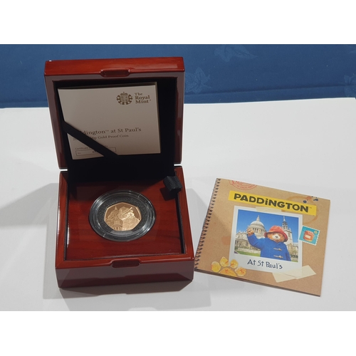 311 - A 2019 Paddington at St Pauls gold proof 50 Pence, in case, with COA