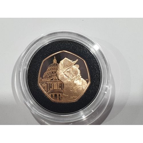 311 - A 2019 Paddington at St Pauls gold proof 50 Pence, in case, with COA