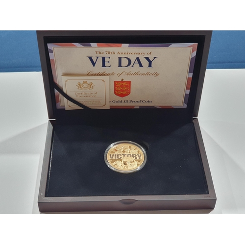 312 - A Guernsey 2015 VE Day gold Five Pounds, in case, with COA