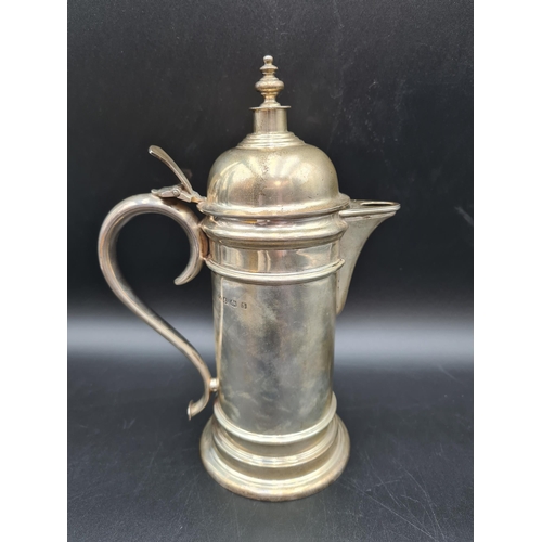 32 - A George VI silver Flagon with domed lid having turned finial, flat thumb piece and scroll handle, B... 