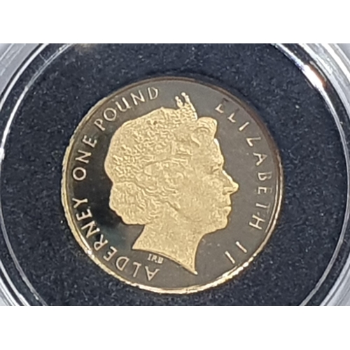 329 - An Alderney 2014 gold proof Dylan Thomas One Pound, in case, with COA